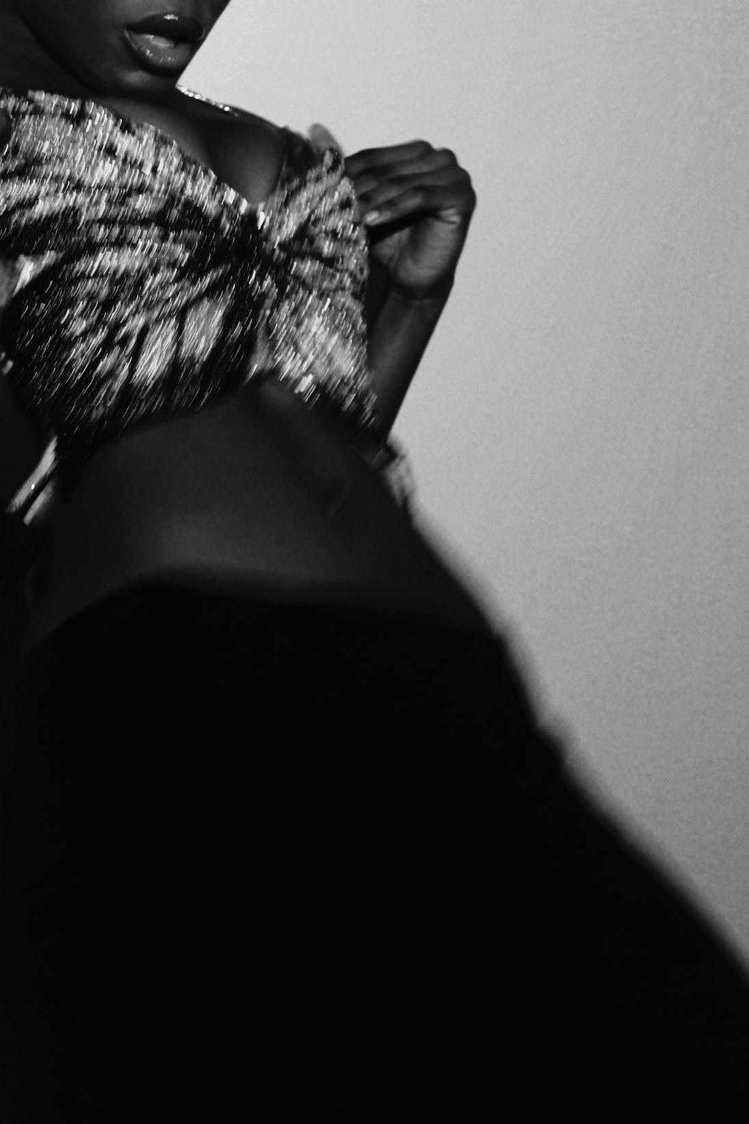 Noa Omane wearing beaded top — black and white editorial